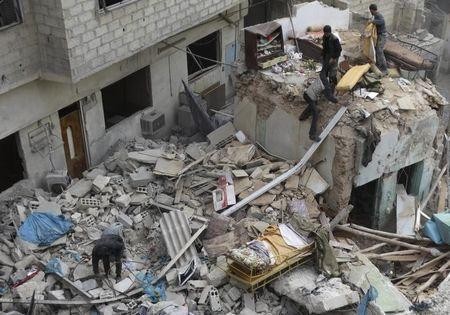Một tòa nhà bị phá hủy trong xung đột Syria
