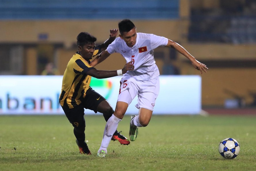 U19 Việt Nam (áo trắng) kết thúc hành trình vòng bảng với chuỗi trận bất bại.