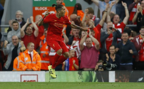 Firmino ghi một bàn và mang về quả phạt đền giúp Liverpool chiến thắng. Ảnh: Reuters.