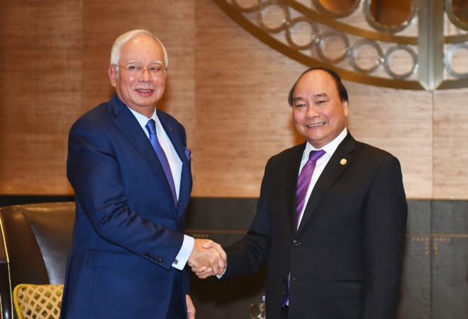 Thủ tướng Nguyễn Xuân Phúc và Thủ tướng Malaysia Najib Razak. Ảnh: VGP/Quang Hiếu.