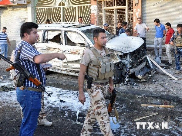 Ảnh minh họa, hiện trường một vụ đánh bom tại Iraq ngày 25/6. (Nguồn: AFP/TTXVN)