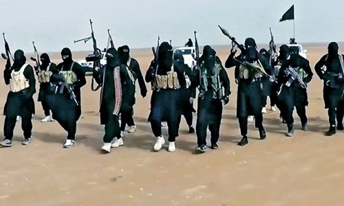Lực lượng khủng bố Nhà nước Hồi giáo tự xưng (IS) làm giàu bằng hành vi gieo rắc tội ác. Ảnh: AFP