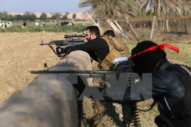 Lực lượng ủng hộ Chính phủ Iraq gác tại Yathreb, cách thủ đô Baghdad 75km về phía bắc. Nguồn: AFP/TTXVN