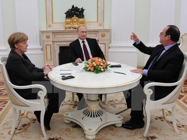 Thủ tướng Đức Angela Merkel, Tổng thống Pháp Francois Hollande và Tổng thống Nga Vladimir Putin hội đàm tại Moskva ngày 6/2. (Nguồn: AFP/TTXVN)