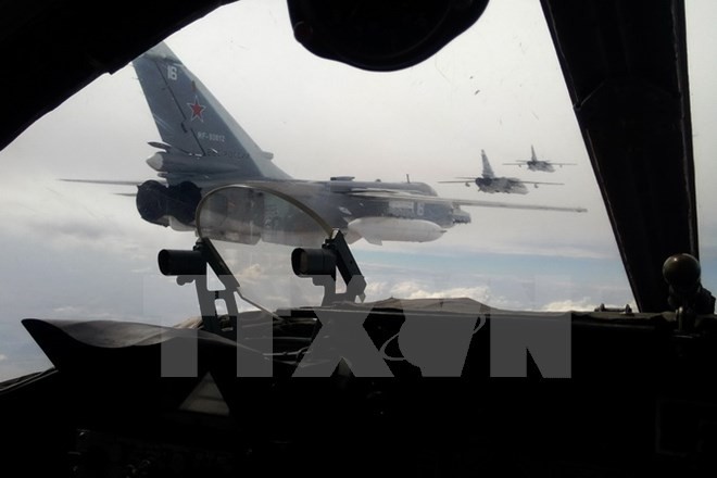 Máy bay ném bom Su-24 của Không quân Nga tham gia cuộc tập trận tại Crimea. (Nguồn:AFP/TTXVN)