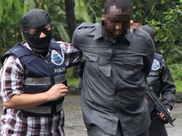 Cảnh sát Malaysia bắt giữ một nghi phạm khủng bố. Ảnh minh họa. (Nguồn: The Star)