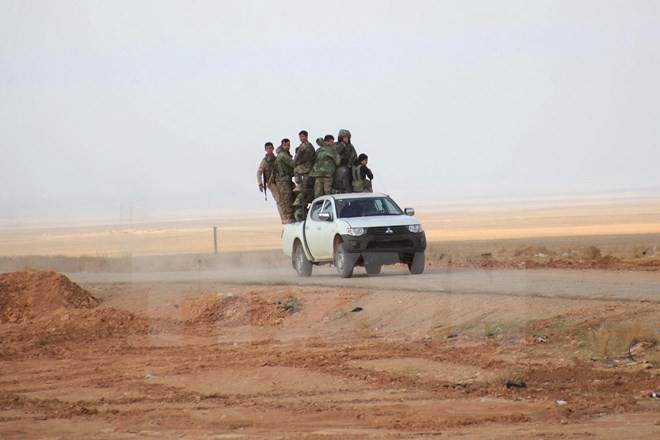 Lực lượng ủng hộ Chính phủ sau khi giành lại quyền kiểm soát tuyến đường tiếp tế duy nhất tới thành phố Aleppo. (Nguồn: AFP/TTXVN)