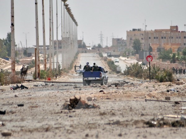 Các chiến binh người Kurd tại khu vực ngoại ô Al-Nashwa, tỉnh Hasakeh của Syria ngày 26/7. (Nguồn: AFP/TTXVN)
