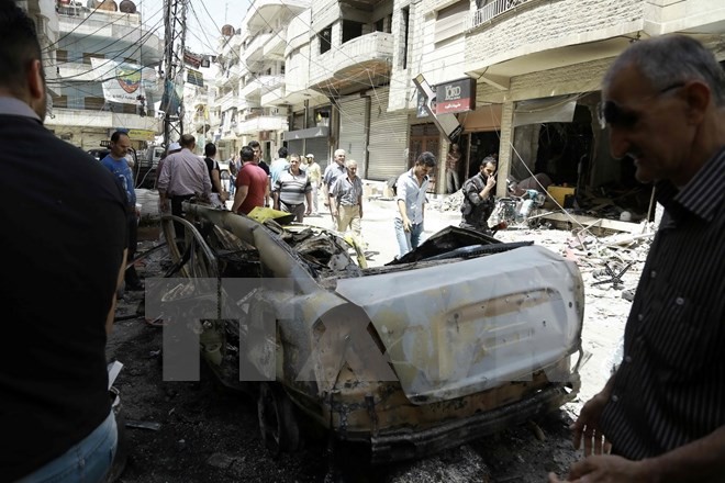 Hiện trường một vụ đánh bom liều chết ở Syria. (Nguồn: AFP/TTXVN)
