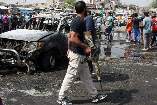 Hiện trường một vụ nổ bom ở Baghdad, Iraq. (Nguồn: foreignpolicy.com)