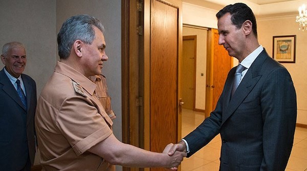 Bộ trưởng Quốc phòng Nga Sergei Shoigu và Tổng thống Syria Bashar al-Assad. (Nguồn: RT)