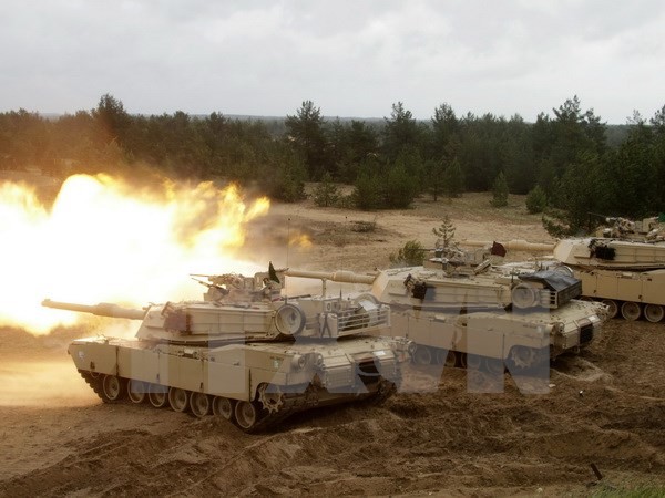 Xe tăng của quân đội Mỹ trong cuộc tập trận Saber Strike tại Latvia ngày 11/6. (Nguồn: EPA/TTXVN)
