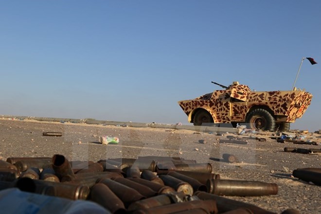 Lực lượng ủng hộ Chính phủ Libya trong chiến dịch giành lại thành phố Sirte từ tay IS ngày 3/8. Nguồn: AFP/TTXVN.