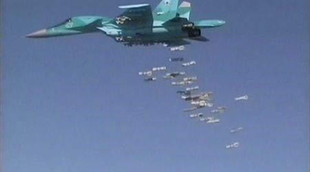 Hình ảnh máy bay Nga ném bom xuống Syria sau khi cất cánh từ căn cứ quân sự ở Iran (Nguồn: Reuters)