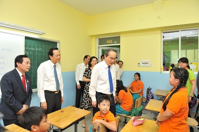 Chủ tịch Ủy ban TƯ MTTQ Việt Nam Nguyễn Thiện Nhân thăm 1 cơ sở giáo dục của trường ĐH Nguyễn Tất Thành chiều 24/2.