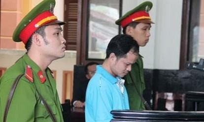Võ Văn Minh nghe tòa tuyên án ngày 18/12/2015. Ảnh: Tân Châu