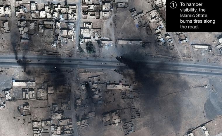 Khói đen bên trong Mosul qua ảnh vệ tinh chụp ngày 18/10.