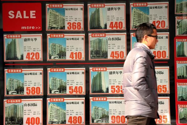 Các quảng cáo nhà đất "sinh lợi cao" sẽ bị cấm tại Bắc Kinh. Ảnh:AFP