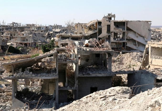 Thành phố Deraa bị tàn phá do chiến tranh. Ảnh: Reuters