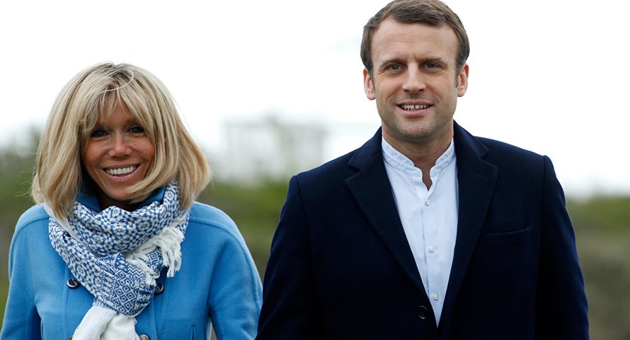Tổng thống Emmanuel Macron và phu nhân Brigitte Macron. Ảnh: Reuters