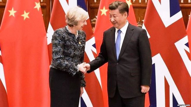 Thủ tướng Anh Theresa May (trái) và Chủ tịch Trung Quốc Tập Cận Bình. Ảnh: Getty
