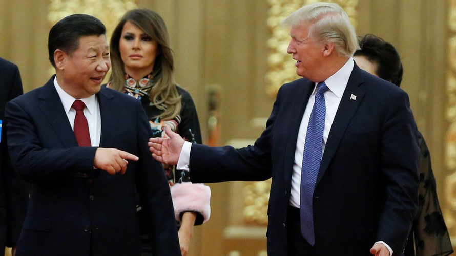 Tổng thống Mỹ Donald Trump (phải) và Chủ tịch Trung Quốc Tập Cận Bình. Ảnh: Reuters