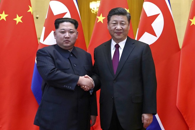 Chủ tịch Triều Tiên Kim Jong-un bí mật đến Bắc Kinh gặp Chủ tịch Trung Quốc Tập Cận Bình. Ảnh: Tân Hoa Xã