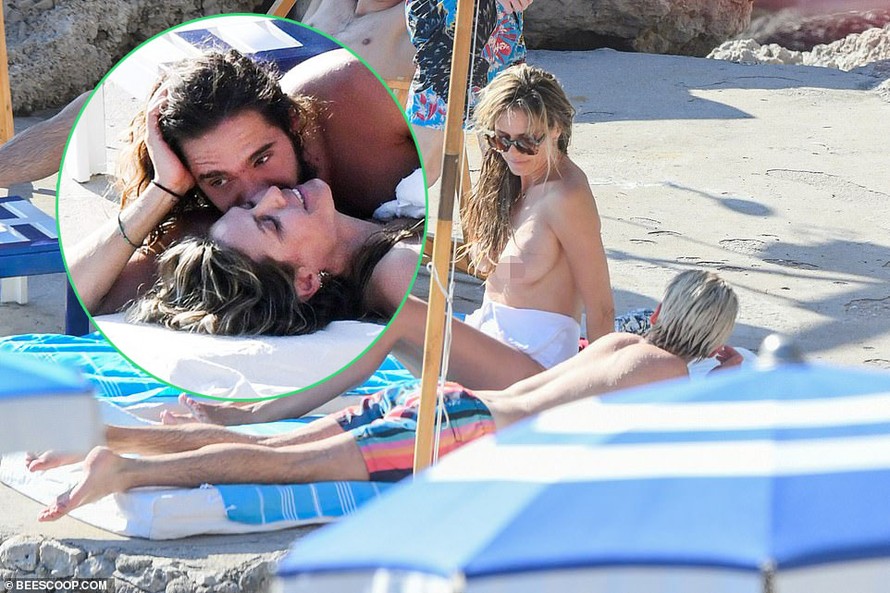 Heidi Klum phơi ngực trần, tình tứ với chồng trẻ kém 16 tuổi trên bãi biển