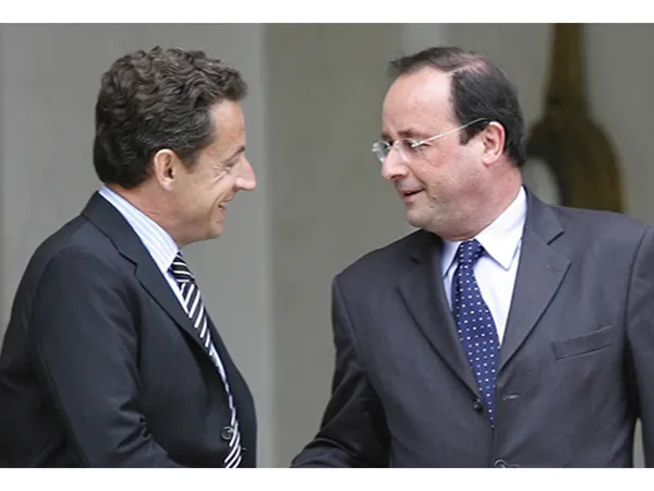 Tổng thống Nicolas Sarkozy (trái) và ứng viên Francois Hollande Ảnh: Paris Match