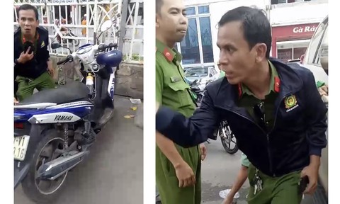 Đối tượng Bảo (mặc áo khoác đen) giả cảnh sát để trộm cắp bị bắt quả tang. Ảnh CATP