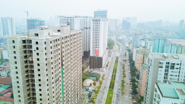 Chung cư đua nhau mọc lên bức tử hạ tầng giao thông trên trục đường Lê Văn Lương - Tố Hữu (Hà Nội). Ảnh: Internet