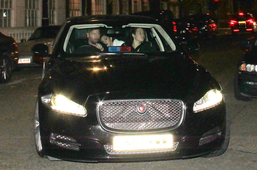 The singer's Jaguar has police lights and sirens.
