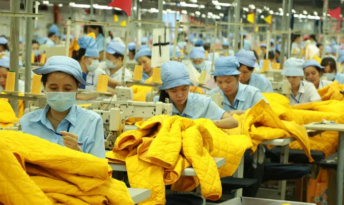 Mức tăng lương tối thiểu vùng năm 2018 có thể tương đương năm 2017. Ảnh: Phạm Thanh.