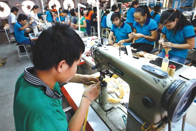 Nhiều doanh nghiệp bị vây bọc trong ma trận điều kiện kinh doanh. ảnh: hồng vĩnh