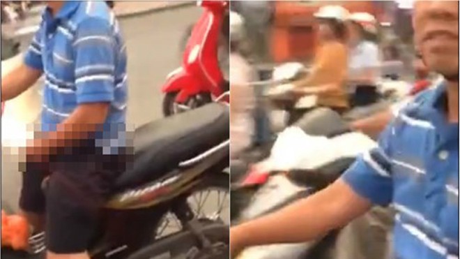 Kể cả khi dừng chờ đèn đỏ, người này cũng không dừng hành động khiếm nhã của mình lại, bất chấp đang bị nhiều người dòm ngó, ghi hình. 