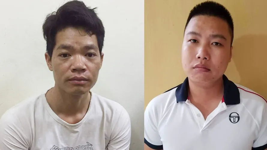 Thám và Đại (từ trái sang phải) tại cơ quan công an