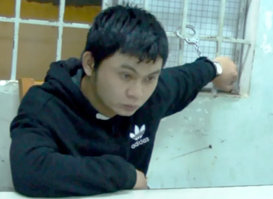 Nghi can Vũ Ngọc Hiếu tại cơ quan công an.