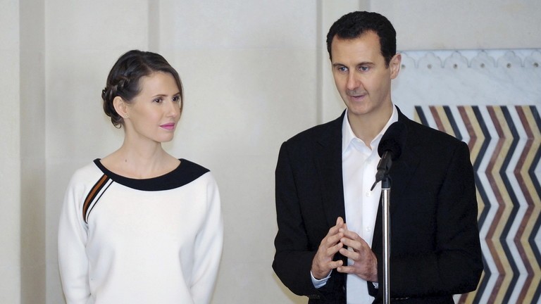 Ông Assad và phu nhân. Ảnh: SANA