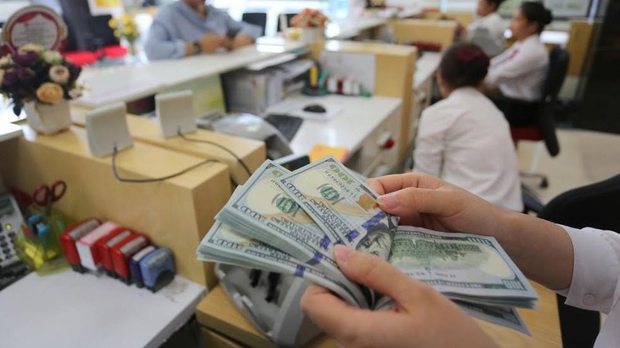 Chuyên gia kinh tế lý giải về nguyên nhân khiến tỷ giá trung tâm tăng cao. ảnh minh hoạ 