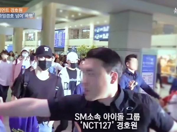 Vệ sĩ của NCT bị tố đánh phóng viên đến rách cả môi ở sân bay