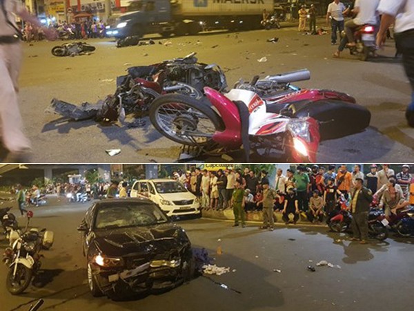 TP.HCM: Xe BMW tông nát 5 xe máy dừng đèn đỏ làm 6 người thương vong