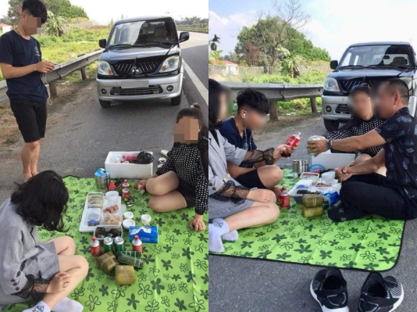 Gia đình trải bạt ngồi ăn ngay trên đường cao tốc Nội Bài - Lào Cai ngỡ như ở nhà hàng