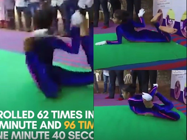 Kỷ lục thế giới: Bé gái 10 tuổi gập người, lăn vòng với tư thế yoga