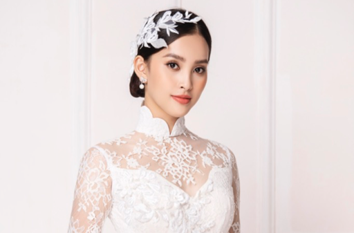 Hoa hậu Tiểu Vy diện áo dài trắng tinh khôi e ấp như "đoá hoa chớm xuân"